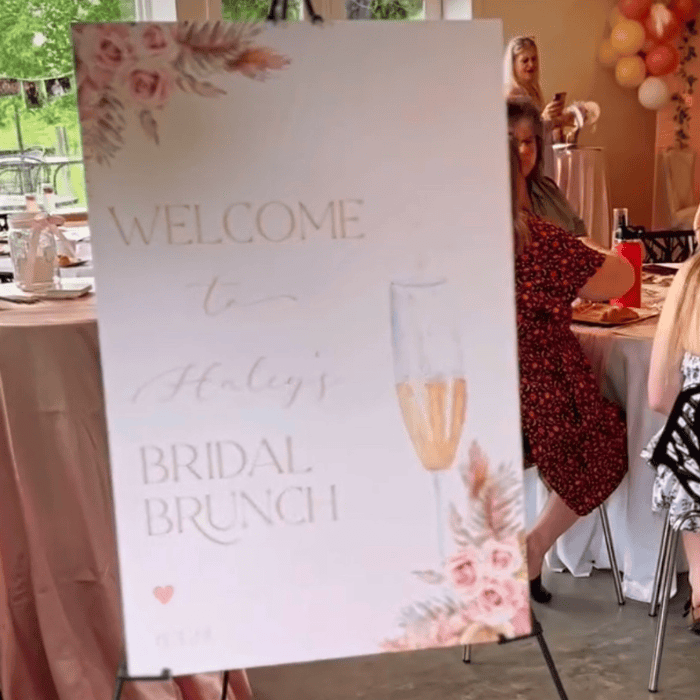 sign welcoming guests to a bridal shower
