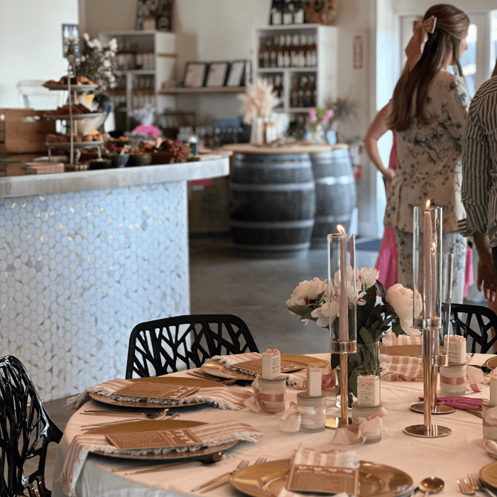 bridal shower tablescape set with flowers and candles